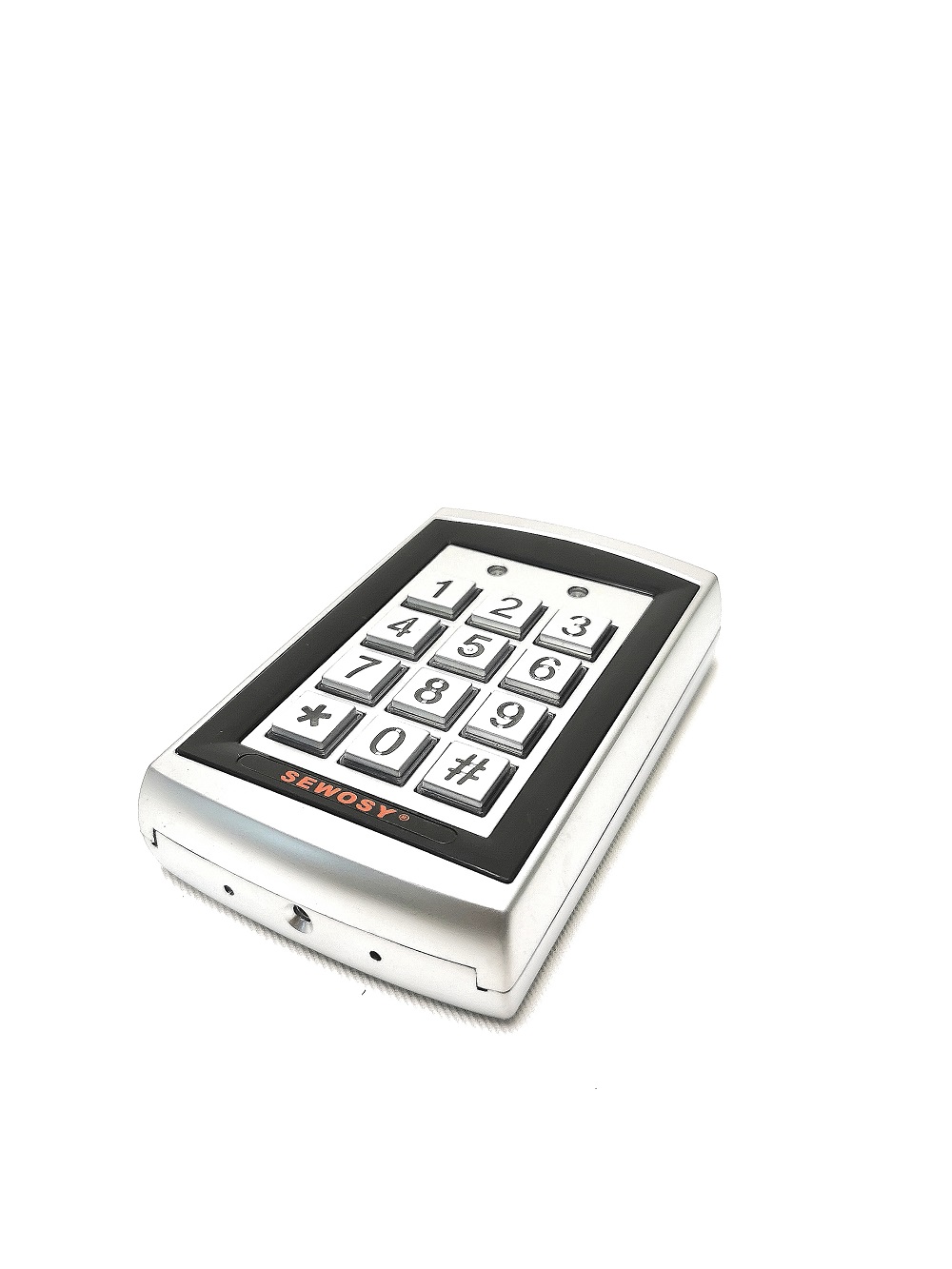 Clavier à code SEWOSY KRB1000 en zamac avec un lecteur de badges intégré. Le clavier est entièrement résiné. Connexion par bornier à vis.